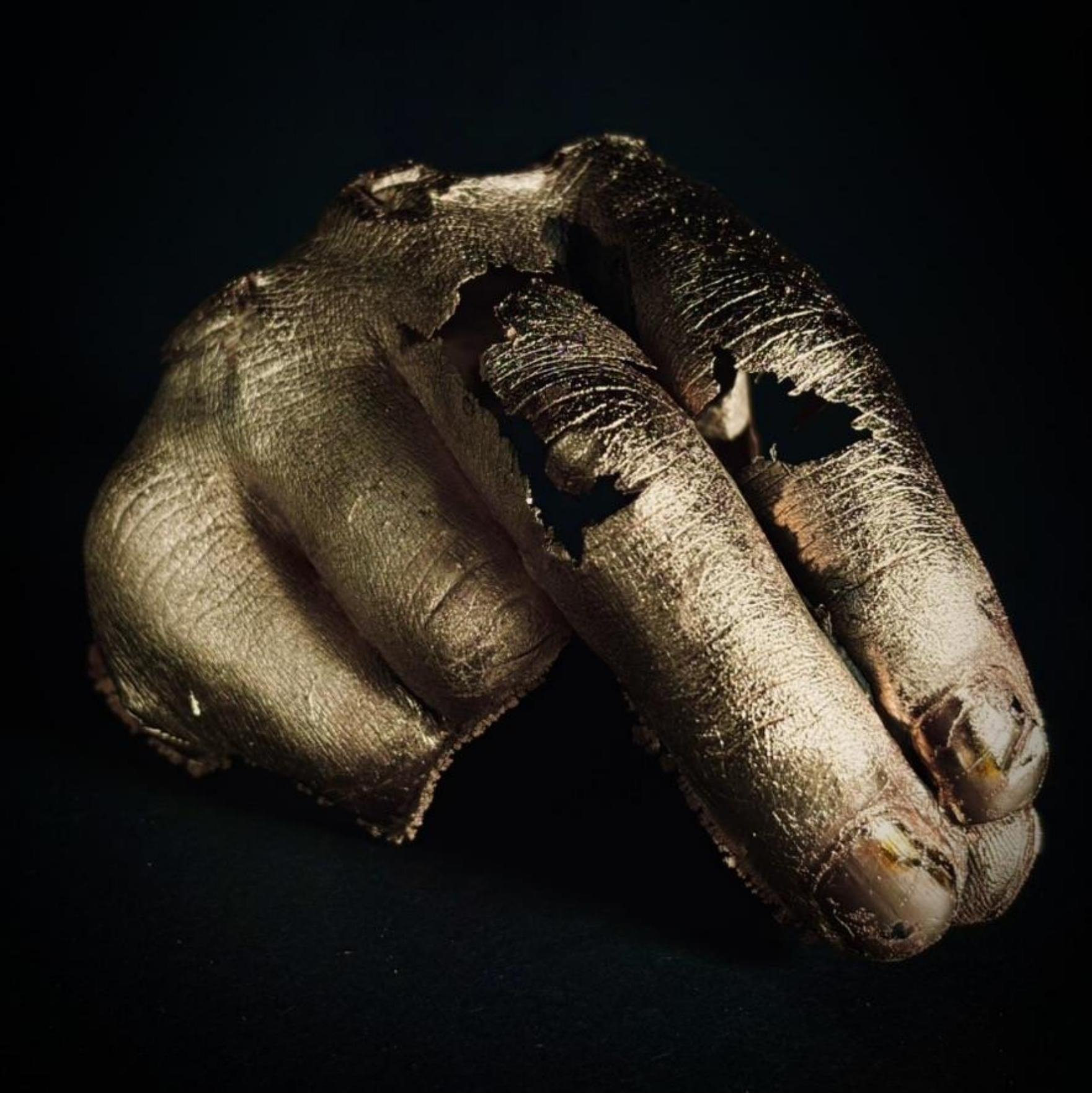Detail of unframed grown copper hand sculpture
